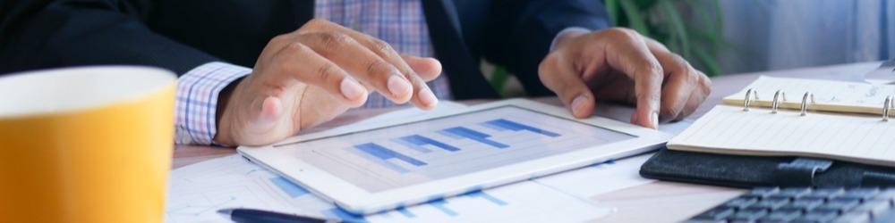 close up of hands on a tablet
